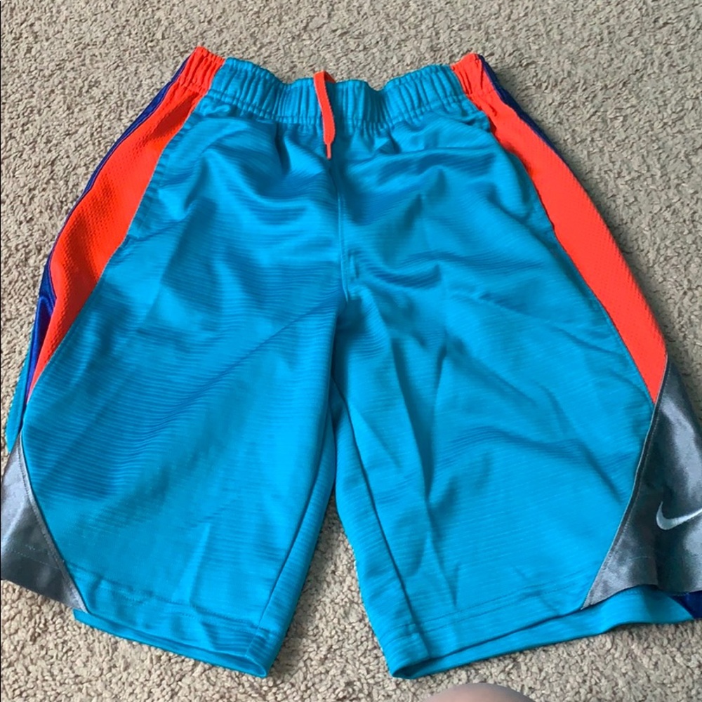 Nike blue and orange basketball shorts